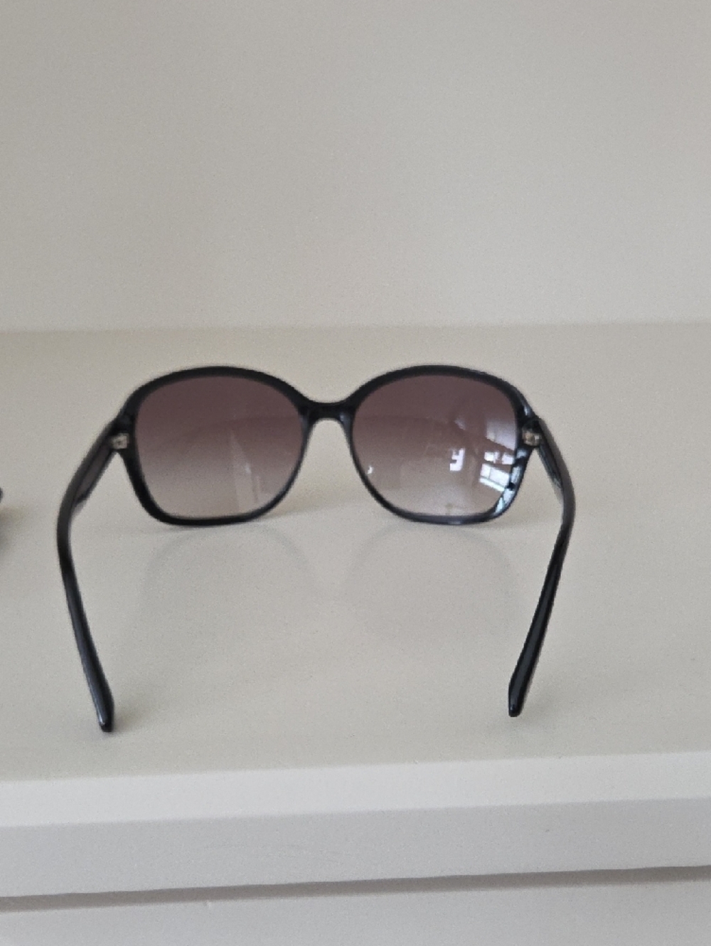 Prada Women’s Black Frame Sunglasses with Smoky Lenses - Picture 4 of 6